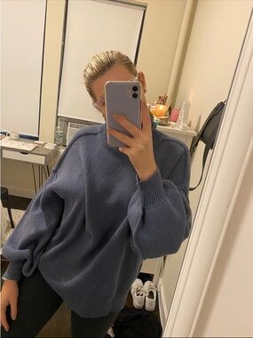 Oversized blue turtleneck sweater